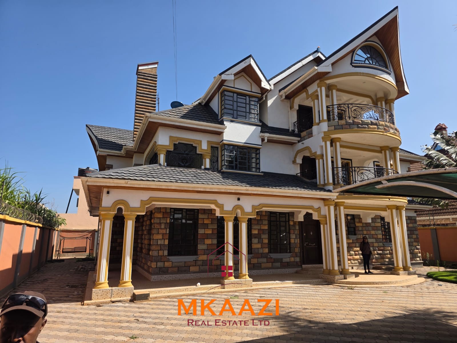 Luxury 6-bedroom all-ensuite mansion for sale in Githingiri Estate, Thika, featuring a gym, safe room, CCTV surveillance, automated gate, electrified perimeter wall, and 35,000-litre underground water tank.