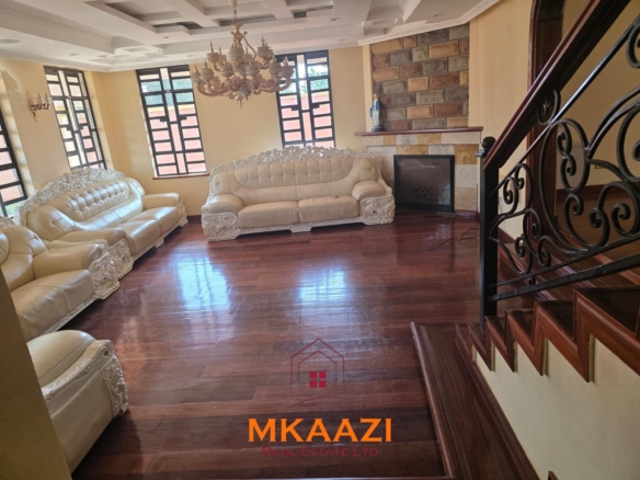 Luxury 6-bedroom all-ensuite mansion for sale in Githingiri Estate, Thika, featuring a gym, safe room, CCTV surveillance, automated gate, electrified perimeter wall, and 35,000-litre underground water tank.