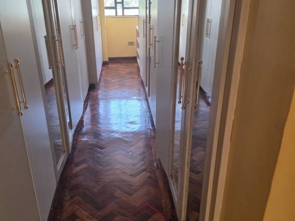 Luxury 6-bedroom all-ensuite mansion for sale in Githingiri Estate, Thika, featuring a gym, safe room, CCTV surveillance, automated gate, electrified perimeter wall, and 35,000-litre underground water tank.