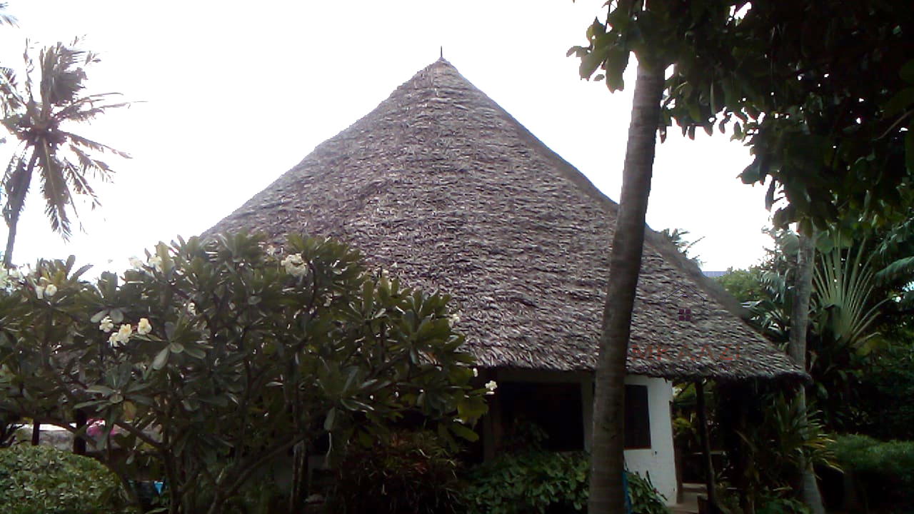 Luxury 3-bedroom villa with staff quarter for sale in Aquarius Watamu on a quarter-acre plot, featuring a gazebo, spacious porch, and walking distance access to the beach.