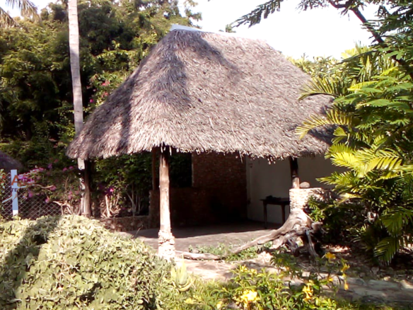 Luxury 3-bedroom villa with staff quarter for sale in Aquarius Watamu on a quarter-acre plot, featuring a gazebo, spacious porch, and walking distance access to the beach.