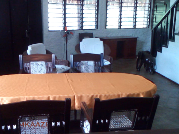 Luxury 3-bedroom villa with staff quarter for sale in Aquarius Watamu on a quarter-acre plot, featuring a gazebo, spacious porch, and walking distance access to the beach.