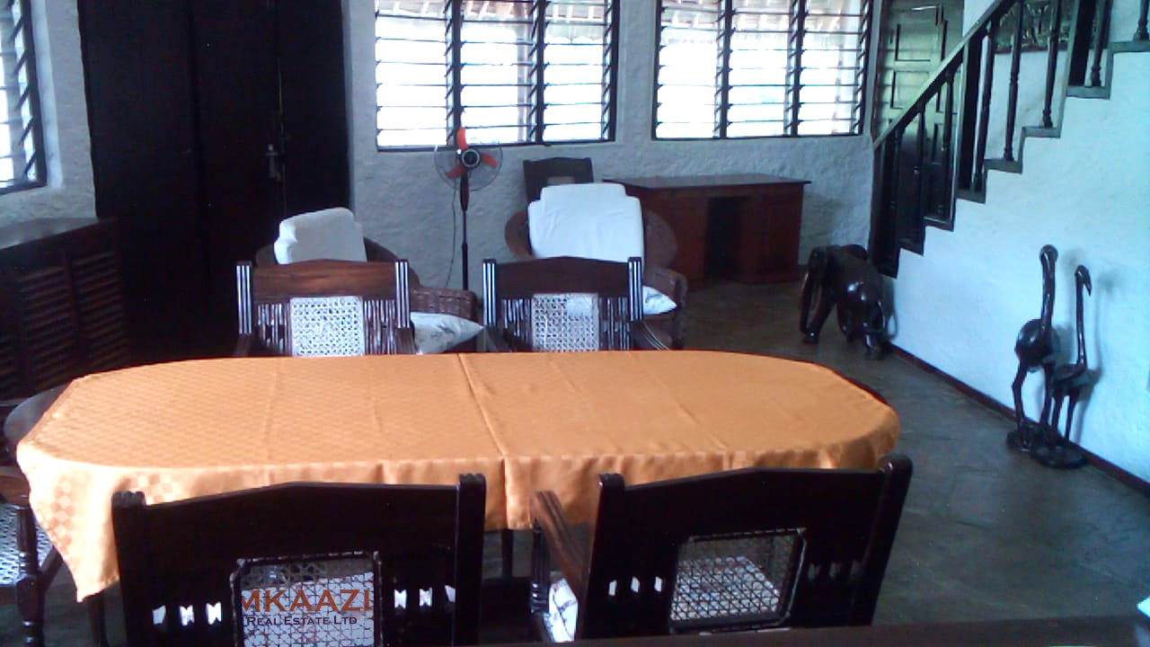 Luxury 3-bedroom villa with staff quarter for sale in Aquarius Watamu on a quarter-acre plot, featuring a gazebo, spacious porch, and walking distance access to the beach.