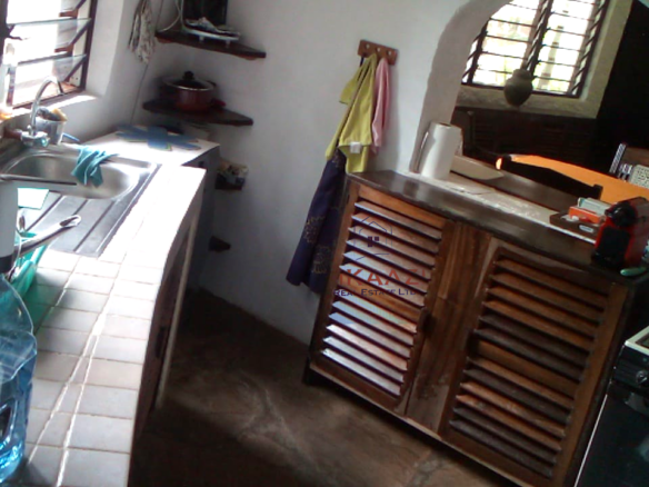 Luxury 3-bedroom villa with staff quarter for sale in Aquarius Watamu on a quarter-acre plot, featuring a gazebo, spacious porch, and walking distance access to the beach.