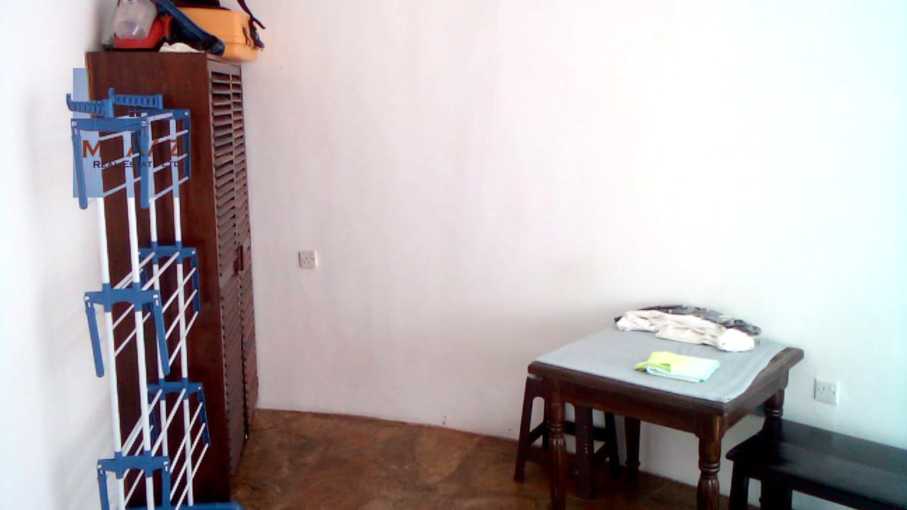 Luxury 3-bedroom villa with staff quarter for sale in Aquarius Watamu on a quarter-acre plot, featuring a gazebo, spacious porch, and walking distance access to the beach.