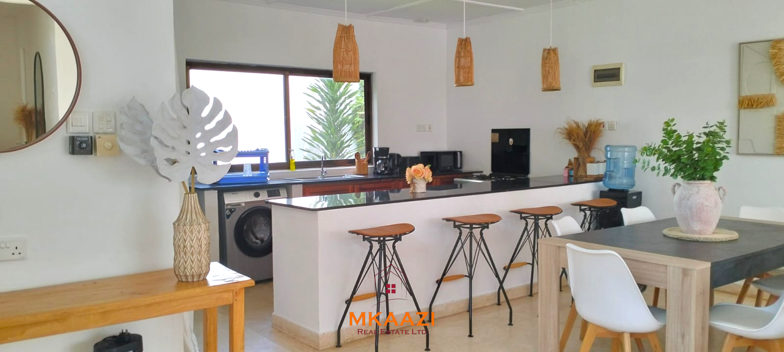 Two 2-bedroom bungalows for sale near Garoda on a quarter-acre property featuring ensuite master bedrooms with bathtubs, swimming pool, landscaped gardens, and operating as a hospitality business.