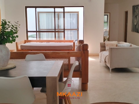 Two 2-bedroom bungalows for sale near Garoda on a quarter-acre property featuring ensuite master bedrooms with bathtubs, swimming pool, landscaped gardens, and operating as a hospitality business.