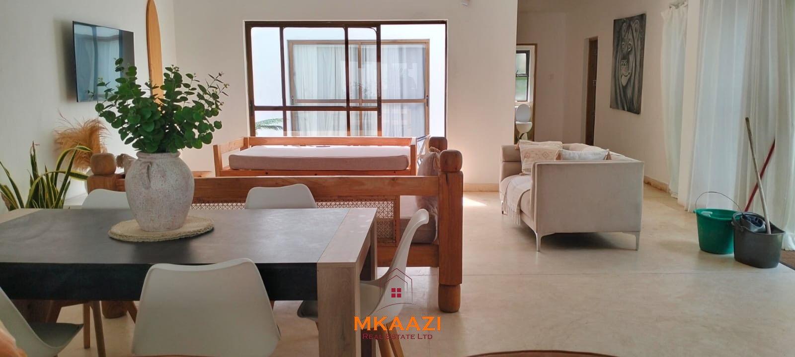 Two 2-bedroom bungalows for sale near Garoda on a quarter-acre property featuring ensuite master bedrooms with bathtubs, swimming pool, landscaped gardens, and operating as a hospitality business.