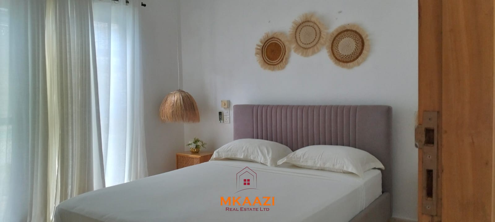 Two 2-bedroom bungalows for sale near Garoda on a quarter-acre property featuring ensuite master bedrooms with bathtubs, swimming pool, landscaped gardens, and operating as a hospitality business.