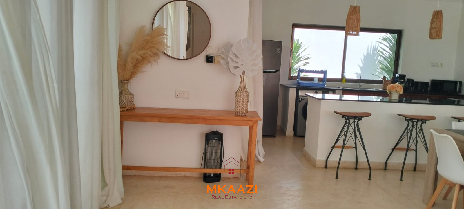 Two 2-bedroom bungalows for sale near Garoda on a quarter-acre property featuring ensuite master bedrooms with bathtubs, swimming pool, landscaped gardens, and operating as a hospitality business.
