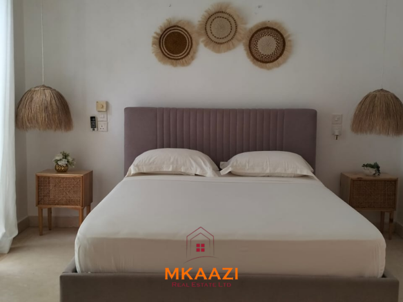 Two 2-bedroom bungalows for sale near Garoda on a quarter-acre property featuring ensuite master bedrooms with bathtubs, swimming pool, landscaped gardens, and operating as a hospitality business.