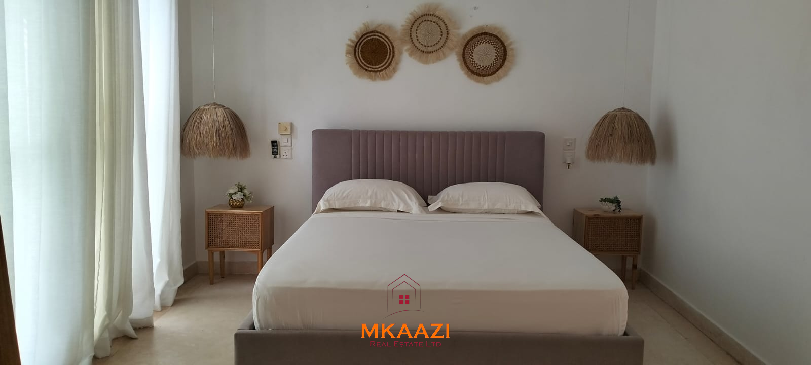 Two 2-bedroom bungalows for sale near Garoda on a quarter-acre property featuring ensuite master bedrooms with bathtubs, swimming pool, landscaped gardens, and operating as a hospitality business.