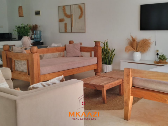 Two 2-bedroom bungalows for sale near Garoda on a quarter-acre property featuring ensuite master bedrooms with bathtubs, swimming pool, landscaped gardens, and operating as a hospitality business.
