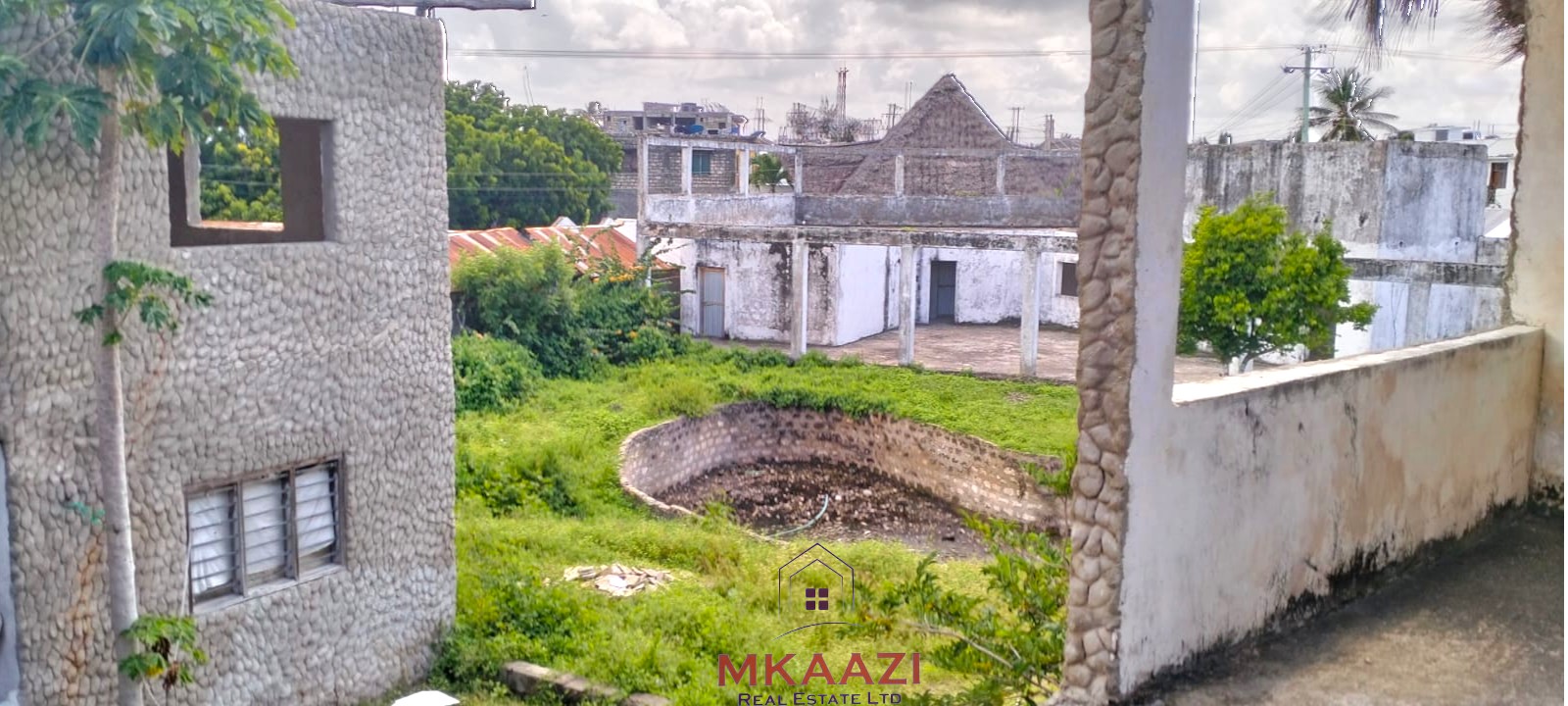 16 one-bedroom units and a 3-bedroom main house for sale near Blue Bay Watamu on 0.4 acres, 300 meters from the beach with a partially completed swimming pool.