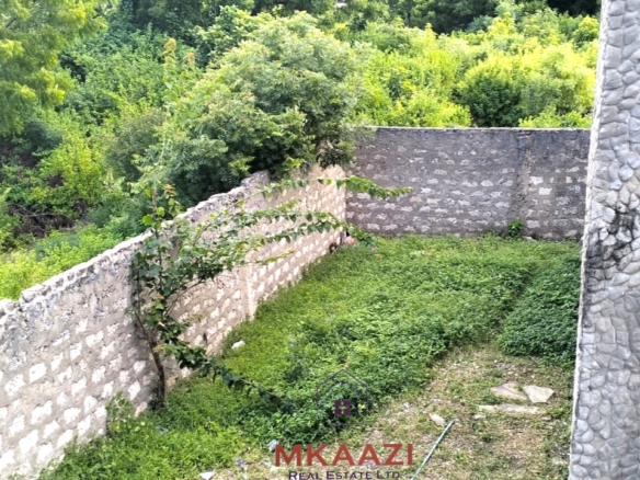 16 one-bedroom units and a 3-bedroom main house for sale near Blue Bay Watamu on 0.4 acres, 300 meters from the beach with a partially completed swimming pool.
