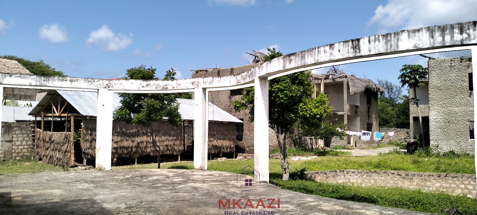 16 one-bedroom units and a 3-bedroom main house for sale near Blue Bay Watamu on 0.4 acres, 300 meters from the beach with a partially completed swimming pool.