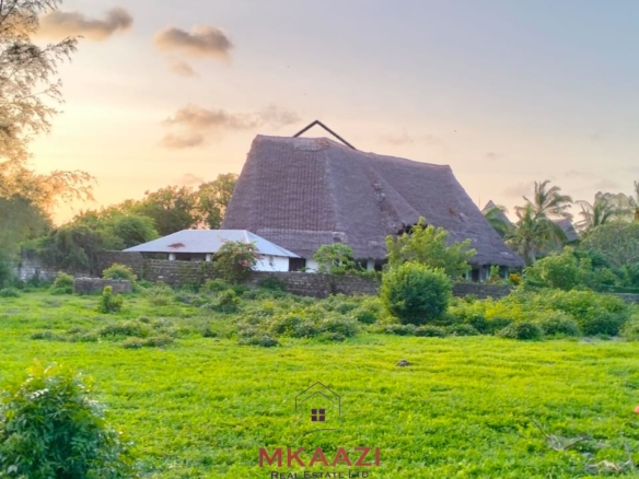 Prime 1.15-acre road frontage property for sale on Casuarina Road, Malindi, located directly on tarmac and within walking distance to the beach.