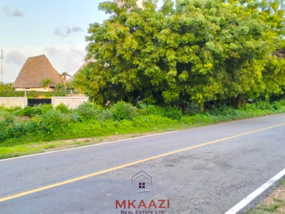 Prime 1.15-acre road frontage property for sale on Casuarina Road, Malindi, located directly on tarmac and within walking distance to the beach.