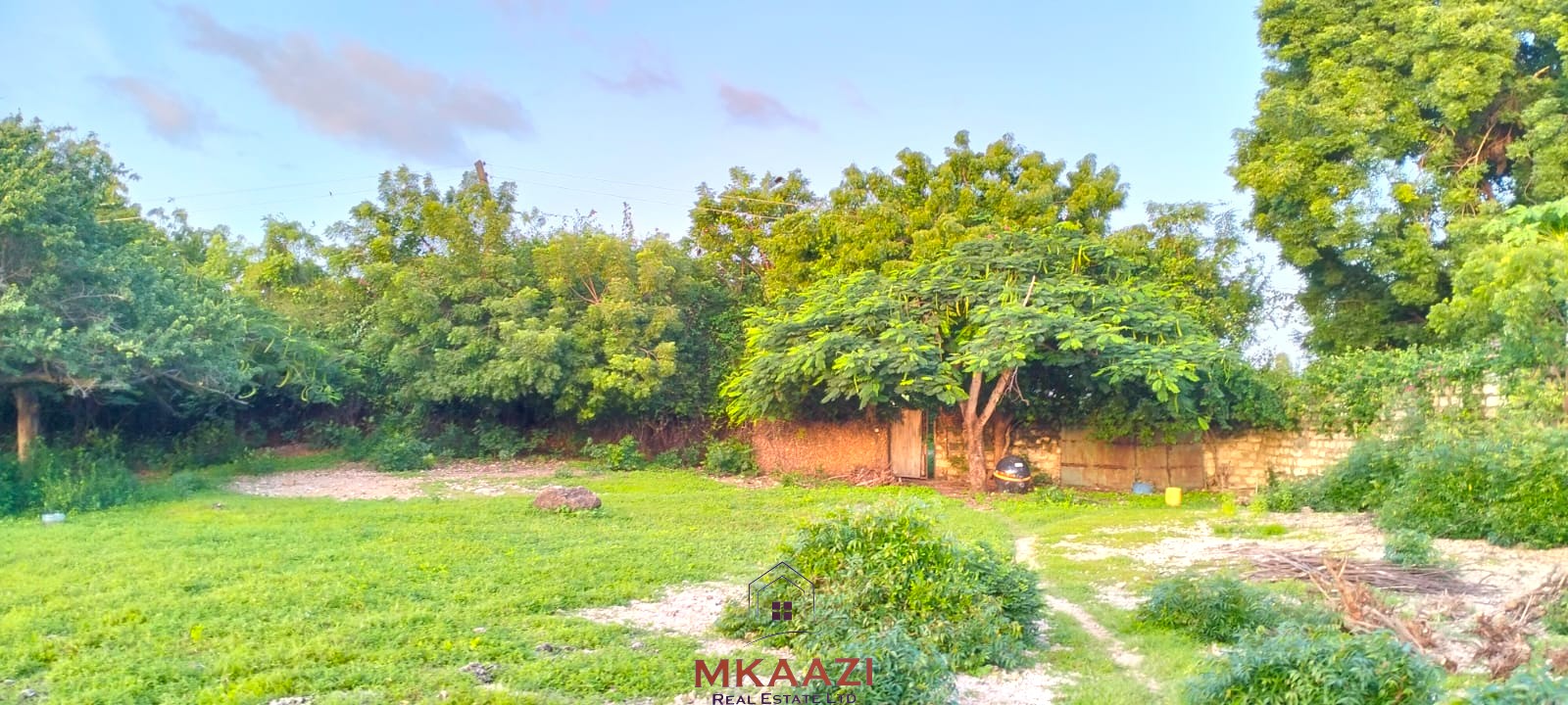Prime 1.15-acre road frontage property for sale on Casuarina Road, Malindi, located directly on tarmac and within walking distance to the beach.