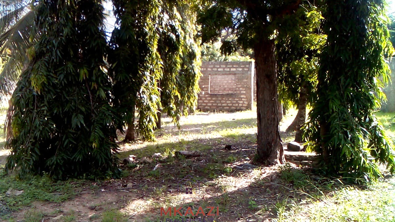 ½ acre freehold property for sale in Garoda Watamu with five semi-finished one and two-bedroom units, ideal for rental income and hospitality investment.