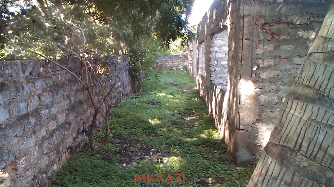 ½ acre freehold property for sale in Garoda Watamu with five semi-finished one and two-bedroom units, ideal for rental income and hospitality investment.