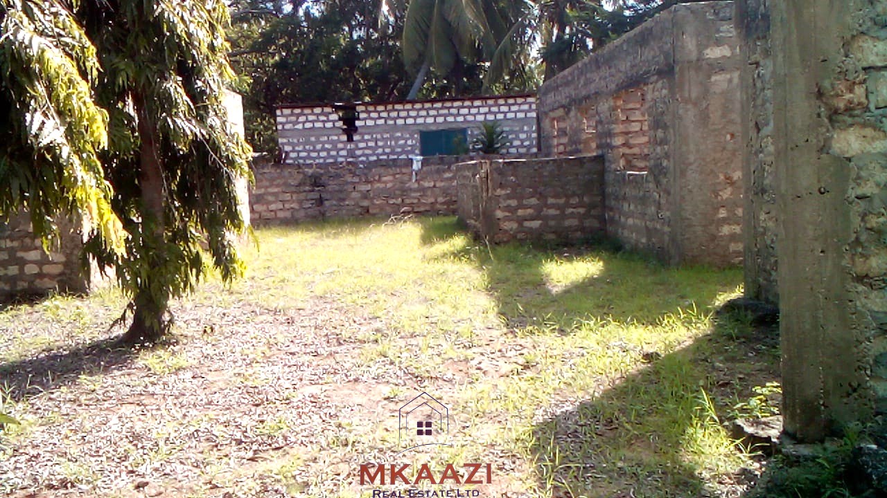 ½ acre freehold property for sale in Garoda Watamu with five semi-finished one and two-bedroom units, ideal for rental income and hospitality investment.