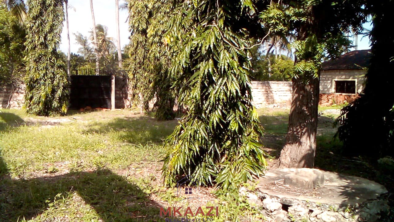 ½ acre freehold property for sale in Garoda Watamu with five semi-finished one and two-bedroom units, ideal for rental income and hospitality investment.