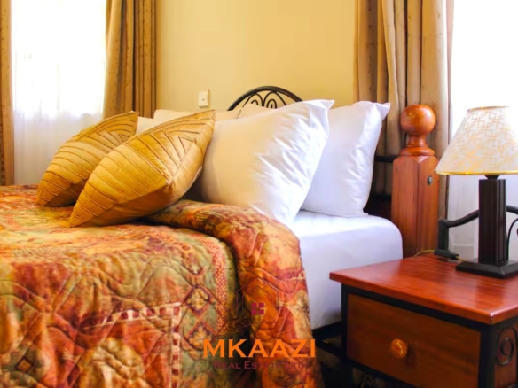 Luxury 3-bedroom apartment for sale in Lavington Nairobi, measuring 121 sqm, available furnished at KSh 14.5M or unfurnished at KSh 13.5M within a secure gated and walled community.