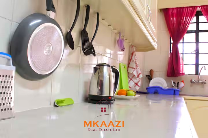 Luxury 3-bedroom apartment for sale in Lavington Nairobi, measuring 121 sqm, available furnished at KSh 14.5M or unfurnished at KSh 13.5M within a secure gated and walled community.