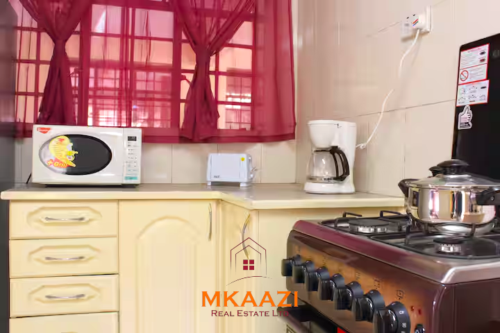 Luxury 3-bedroom apartment for sale in Lavington Nairobi, measuring 121 sqm, available furnished at KSh 14.5M or unfurnished at KSh 13.5M within a secure gated and walled community.