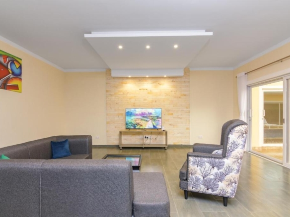 Bright living room inside a 3-bedroom home at Fahari Residence in Malindi