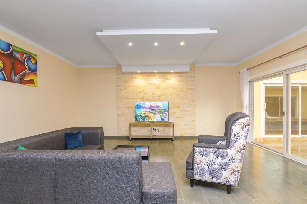 Bright living room inside a 3-bedroom home at Fahari Residence in Malindi