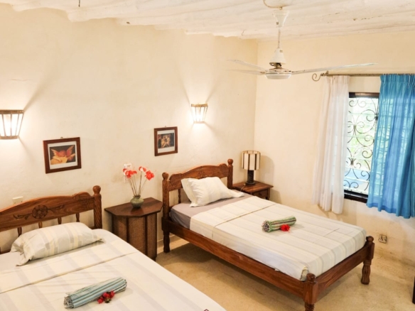 Luxury fully furnished 4-bedroom ensuite villa in Watamu available for Summertides Festival accommodation with swimming pool, Wi-Fi, air conditioning, housekeeping, and 24-hour security.