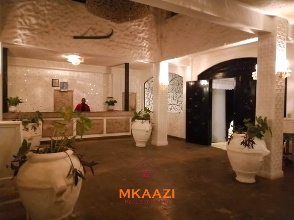 Fully furnished 85 sqm one-bedroom apartment for sale at Blue Marlin Sporting Resort Malindi with pool, gym, security, reception, and beach access.