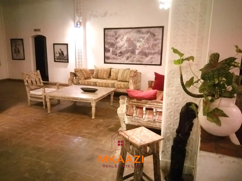 Fully furnished 85 sqm one-bedroom apartment for sale at Blue Marlin Sporting Resort Malindi with pool, gym, security, reception, and beach access.