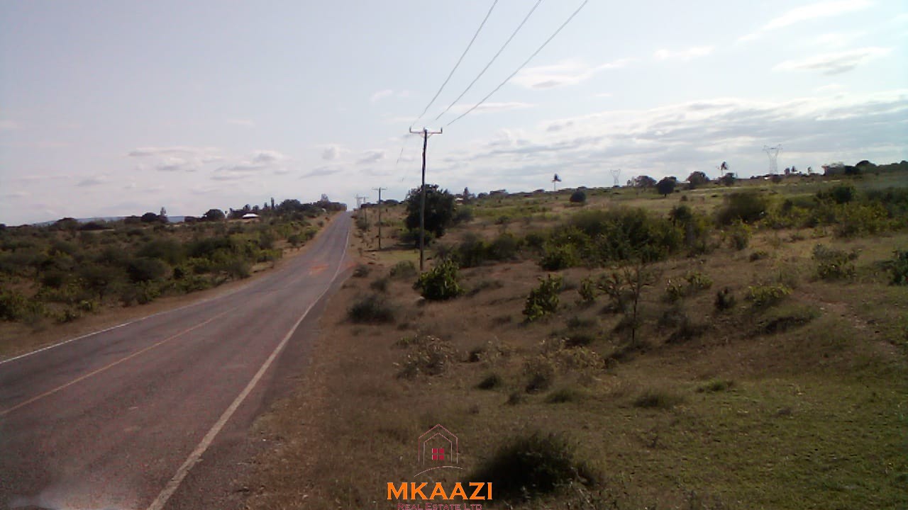 Prime 9-acre road frontage land for sale in Kakoneni Malindi with freehold title, water and electricity on site, suitable for residential, commercial and agricultural development.