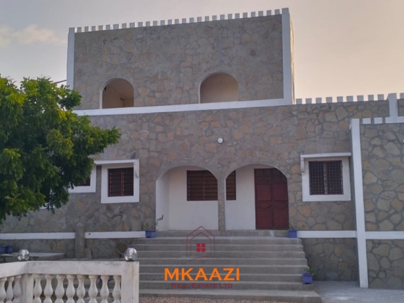 Newly built 3-bedroom house with SQ for rent on Casuarina Road, Malindi, featuring a private compound, ocean views, garden, gazebo, and covered patio.