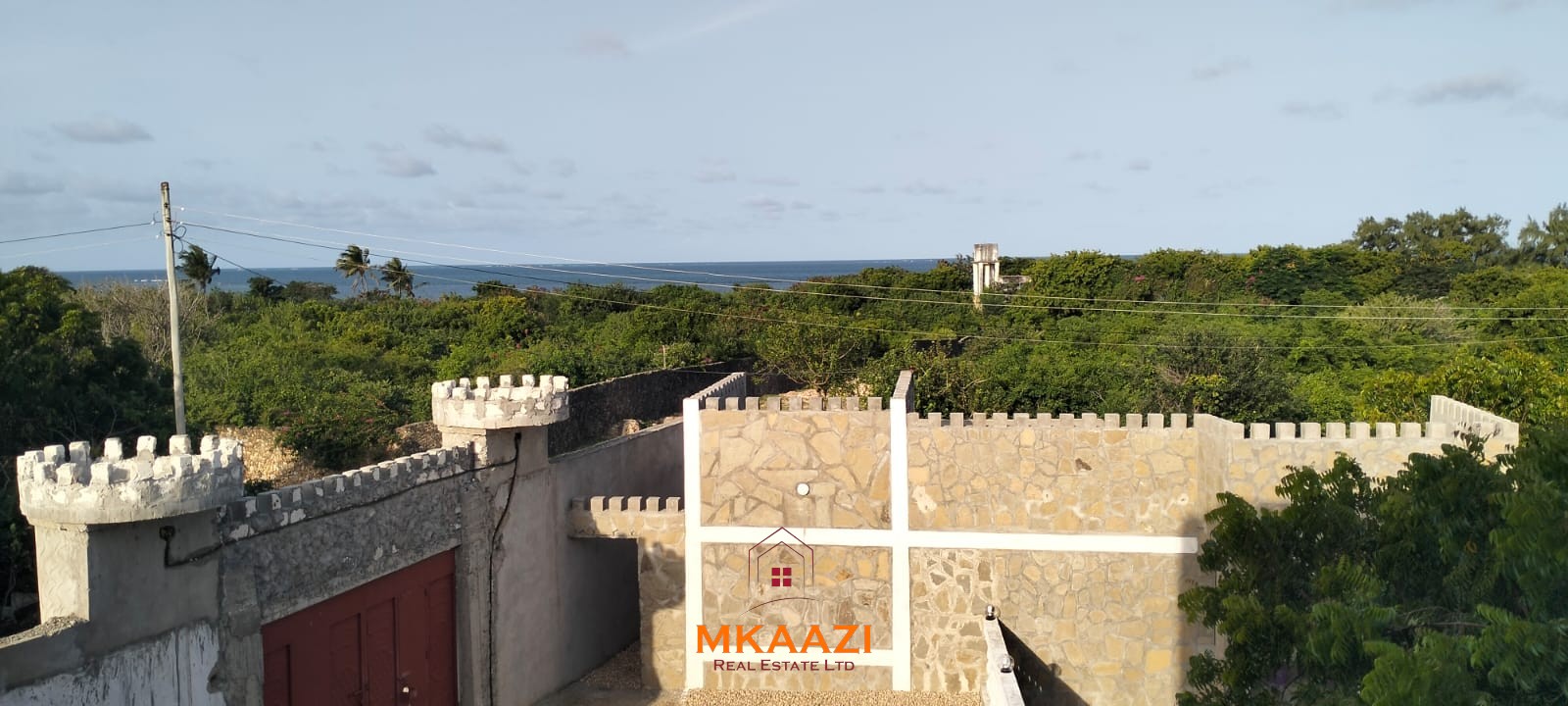 Newly built 3-bedroom house with SQ for rent on Casuarina Road, Malindi, featuring a private compound, ocean views, garden, gazebo, and covered patio.