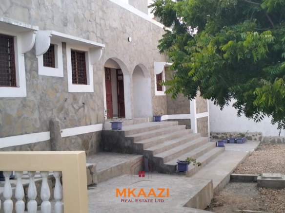 Newly built 3-bedroom house with SQ for rent on Casuarina Road, Malindi, featuring a private compound, ocean views, garden, gazebo, and covered patio.