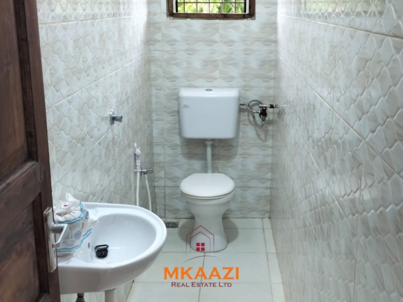 Newly built 3-bedroom house with SQ for rent on Casuarina Road, Malindi, featuring a private compound, ocean views, garden, gazebo, and covered patio.