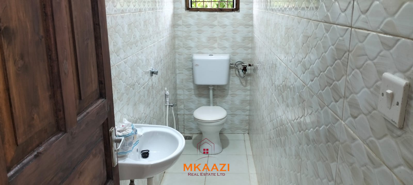 Newly built 3-bedroom house with SQ for rent on Casuarina Road, Malindi, featuring a private compound, ocean views, garden, gazebo, and covered patio.