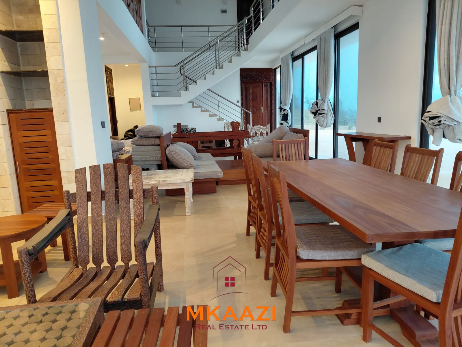Luxury fully furnished 4-bedroom beachfront villa for sale in Love Island, Watamu with private pool, borehole, tropical gardens, and direct access to white sandy beaches.