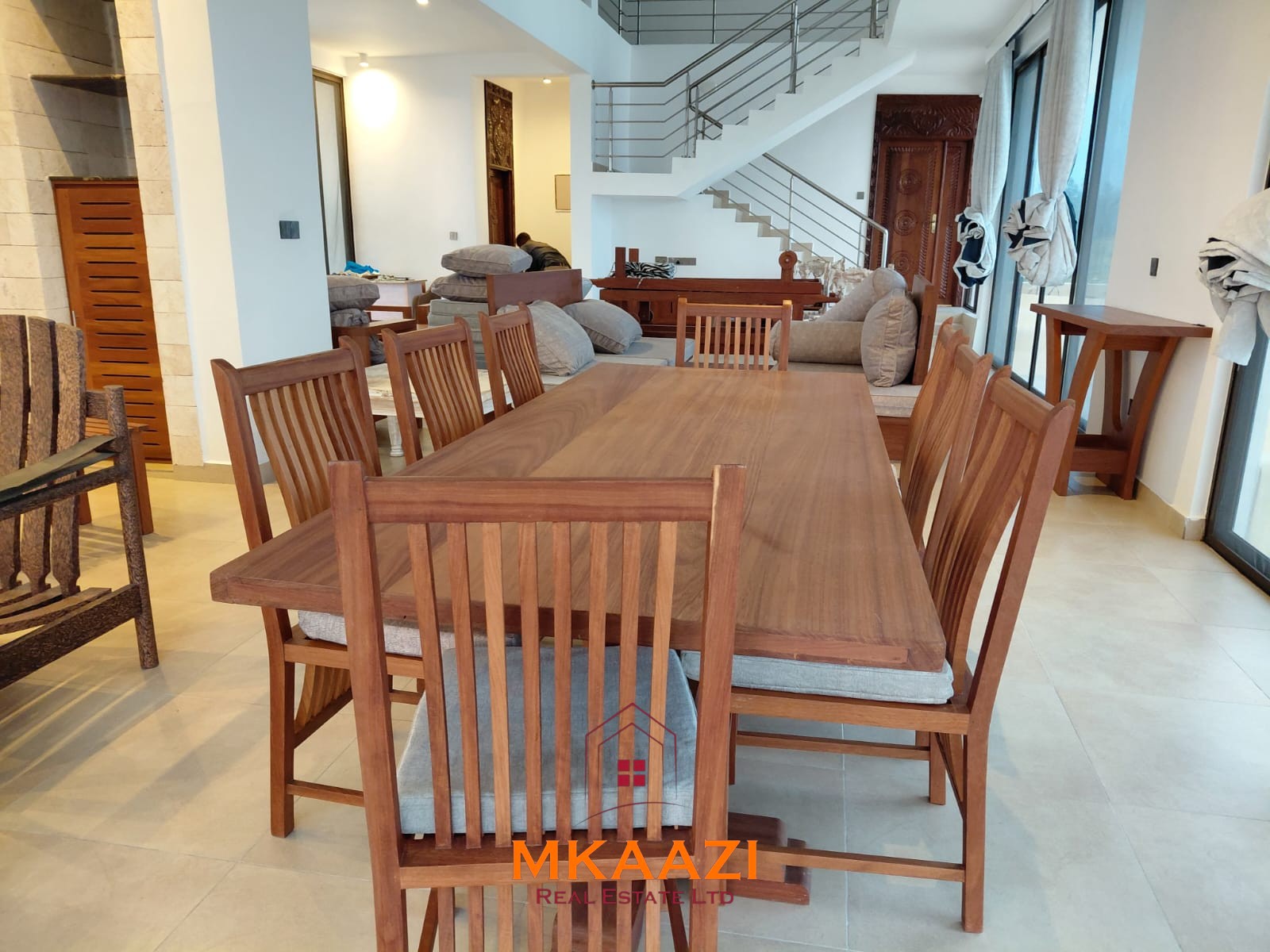 Luxury fully furnished 4-bedroom beachfront villa for sale in Love Island, Watamu with private pool, borehole, tropical gardens, and direct access to white sandy beaches.