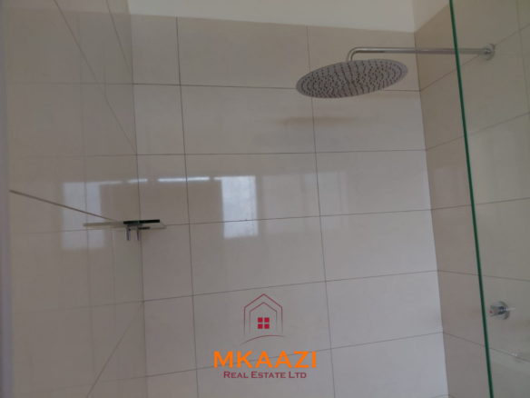 Luxury fully furnished 4-bedroom beachfront villa for sale in Love Island, Watamu with private pool, borehole, tropical gardens, and direct access to white sandy beaches.