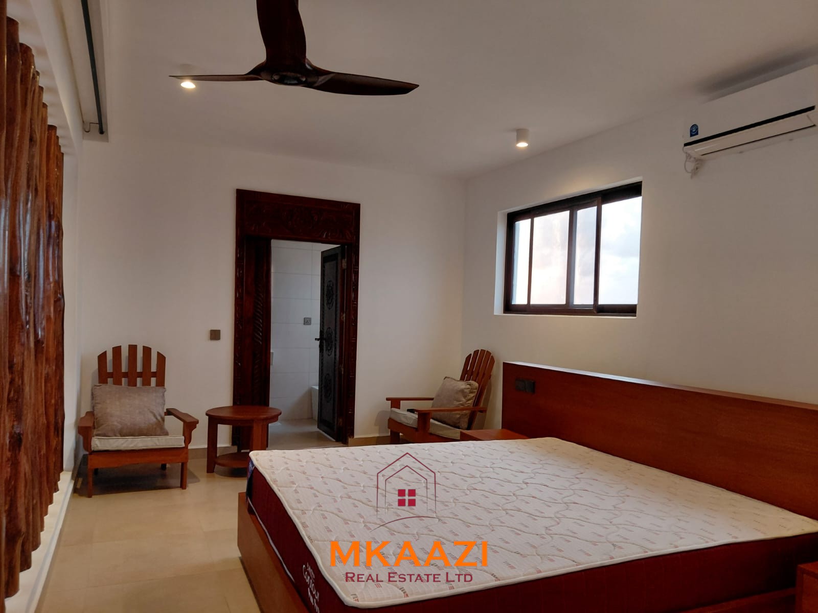 Luxury fully furnished 4-bedroom beachfront villa for sale in Love Island, Watamu with private pool, borehole, tropical gardens, and direct access to white sandy beaches.