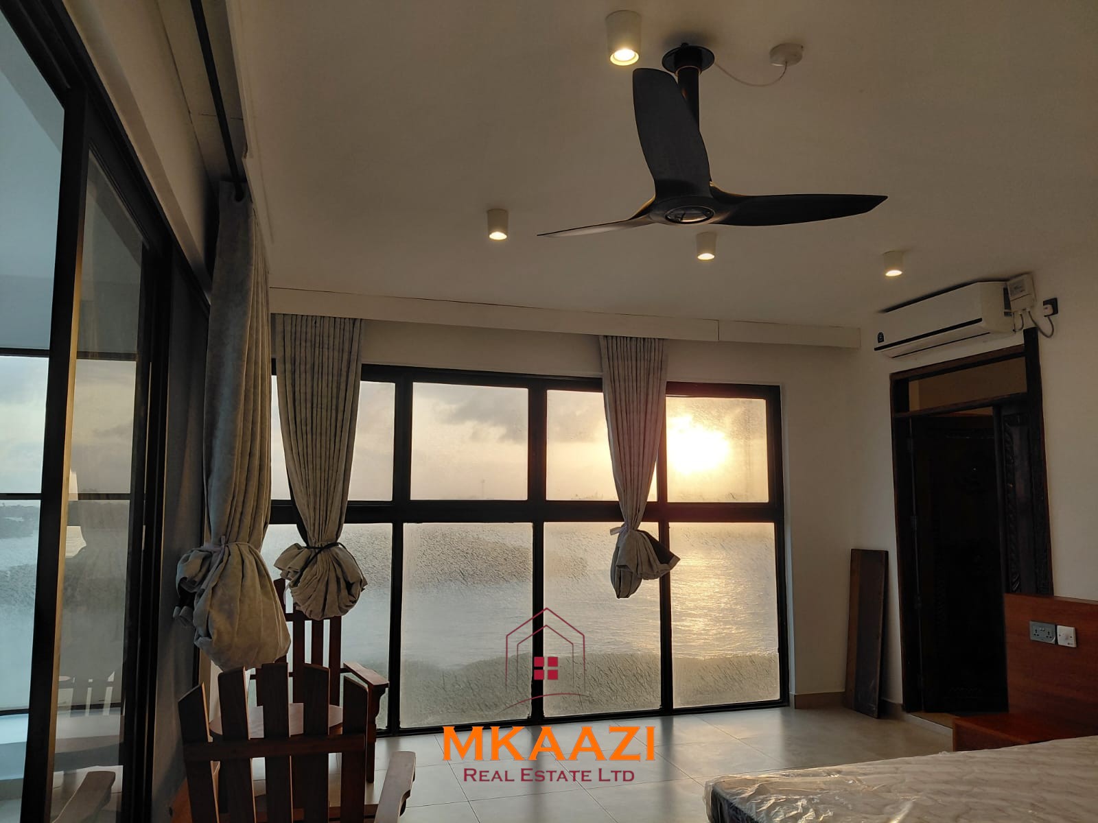 Luxury fully furnished 4-bedroom beachfront villa for sale in Love Island, Watamu with private pool, borehole, tropical gardens, and direct access to white sandy beaches.