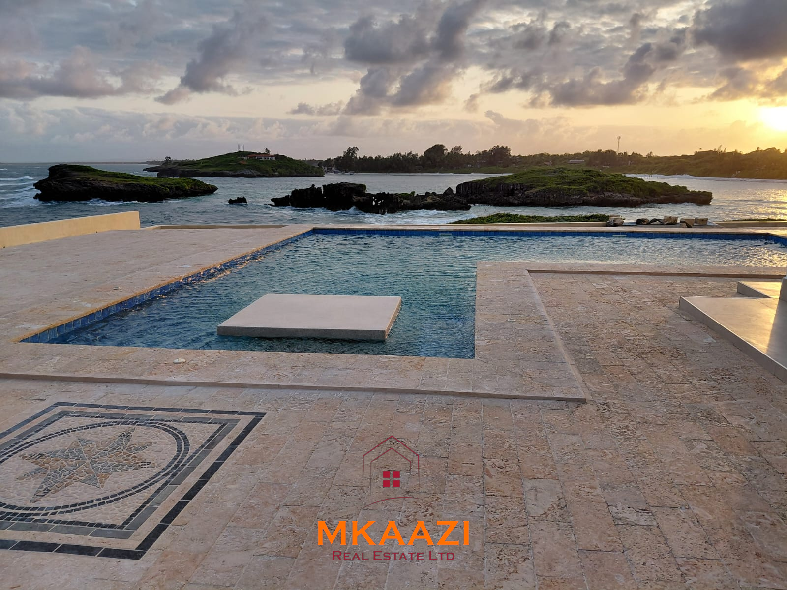 Luxury fully furnished 4-bedroom beachfront villa for sale in Love Island, Watamu with private pool, borehole, tropical gardens, and direct access to white sandy beaches.