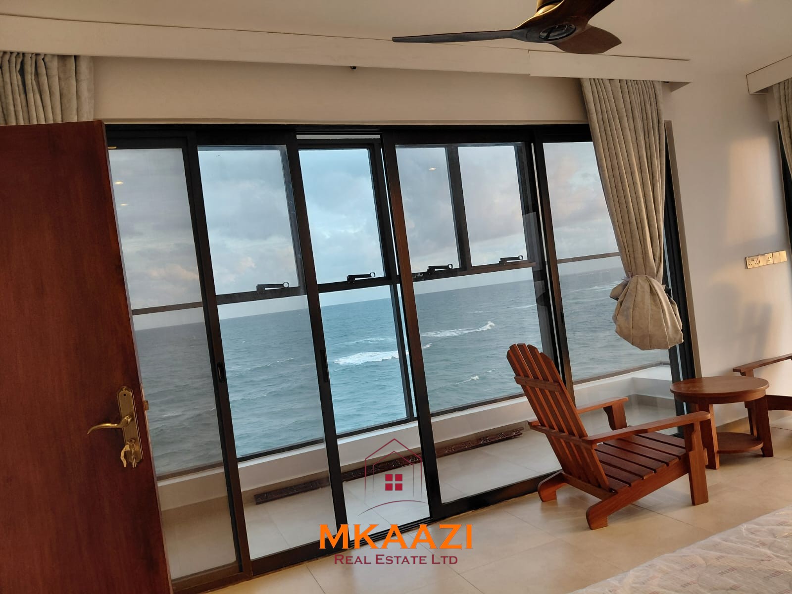 Luxury fully furnished 4-bedroom beachfront villa for sale in Love Island, Watamu with private pool, borehole, tropical gardens, and direct access to white sandy beaches.
