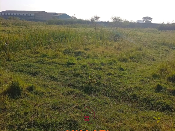5-acre industrial-zoned land for sale in Thika Municipality with ready title deed, flat terrain, and easy access to major roads and utilities.