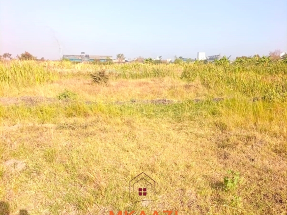 5-acre industrial-zoned land for sale in Thika Municipality with ready title deed, flat terrain, and easy access to major roads and utilities.